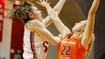Mackenzie Holmes (54) of Indiana Hoosiers and Shay Bollin (...