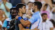 Aug 20, 2023; Mason, OH, USA; Carlos Alcaraz (ESP) hugs Novak Djokovic (SRB) after the game during the men s singles final of the Western and Southern Open tennis tournament at Lindner Family Tennis Center. Mandatory Credit: Katie Stratman-USA TODAY Sports