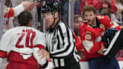 Carolina Hurricanes forward Sebastian Aho and Florida Panthers forward Matthew Tkachuk are separated by a referee during Game 3 of the Eastern Conference finals. 