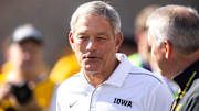 Iowa head coach Kirk Ferentz talks with athletics director Gary Barta before a NCAA Big Ten Conference football game against Rutgers, Saturday, Sept. 7, 2019, at Kinnick Stadium in Iowa City, Iowa.