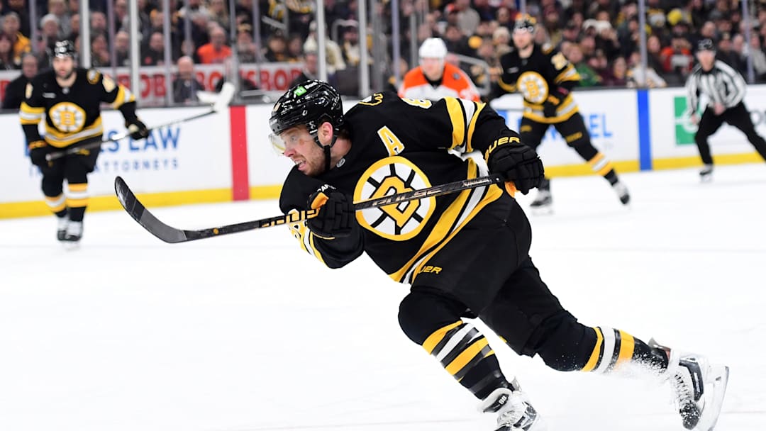 Jan 29, 2026; Boston, Massachusetts, USA; Boston Bruins right wing David Pastrnak (88) shoots the puck during the first period against the Philadelphia Flyers at TD Garden. Mandatory Credit: Bob DeChiara-Imagn Images