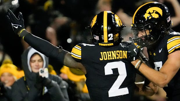 Iowa Hawkeyes running back Kaleb Johnson (2) celebrates his touchdown
