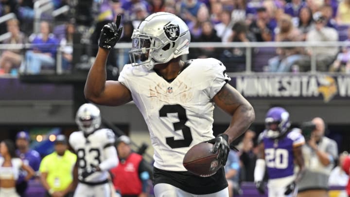 Aug 10, 2024; Minneapolis, Minnesota, USA; Las Vegas Raiders running back Zamir White (3) runs for a touchdown against the Minnesota Vikings during the third quarter at U.S. Bank Stadium. Mandatory Credit: Jeffrey Becker-USA TODAY Sports