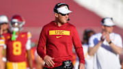 Nov 16, 2024; Los Angeles, California, USA; Southern California Trojans head coach Lincoln Riley watches game action against the Nebraska Cornhuskers during the second half at the Los Angeles Memorial Coliseum. Mandatory Credit: Gary A. Vasquez-Imagn Images