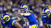 Jan 13, 2025; Glendale, AZ, USA; Los Angeles Rams quarterback Matthew Stafford (9) against the Minnesota Vikings during an NFC wild card game at State Farm Stadium. Mandatory Credit: Mark J. Rebilas-Imagn Images