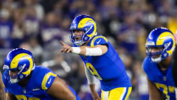 Jan 13, 2025; Glendale, AZ, USA; Los Angeles Rams quarterback Matthew Stafford (9) against the Minnesota Vikings during an NFC wild card game at State Farm Stadium. Mandatory Credit: Mark J. Rebilas-Imagn Images