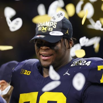 Jan 8, 2024; Houston, TX, USA; Michigan Wolverines defensive lineman Kenneth Grant (78) celebrates after winning 2024 College Football Playoff national championship game against the Washington Huskies at NRG Stadium. Mandatory Credit: Thomas Shea-USA TODAY Sports