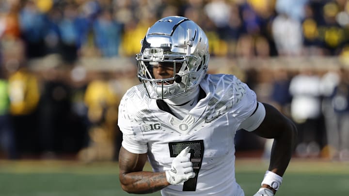 Nov 2, 2024; Ann Arbor, Michigan, USA; Oregon Ducks wide receiver Evan Stewart (7) Ducks wide receiver Tez Johnson (15) runs a route gainst the Michigan Wolverines at Michigan Stadium. Mandatory Credit: Rick Osentoski-Imagn Images Nov 2, 2024; Ann Arbor, Michigan, USA; Oregon Ducks wide receiver Evan Stewart (7) Ducks wide receiver Tez Johnson (15) runs a route gainst the Michigan Wolverines at Michigan Stadium. Mandatory Credit: Rick Osentoski-Imagn Images