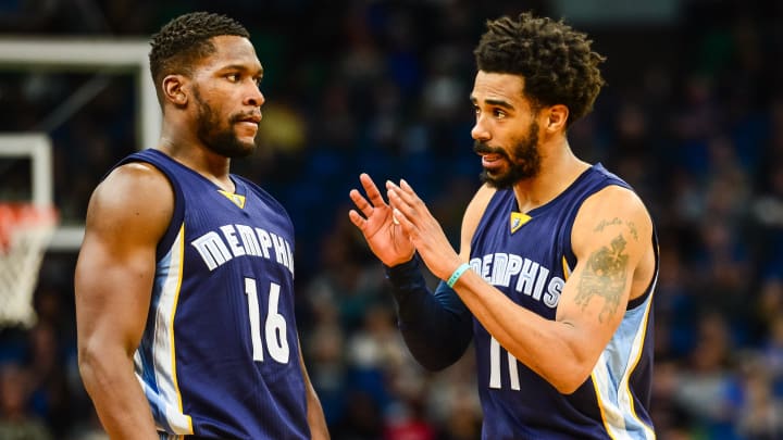 Feb 4, 2017; Minneapolis, MN, USA; Memphis Grizzlies guard Mike Conley (11) talks with guard Toney Douglas (16) during the fourth quarter against the Minnesota Timberwolves at Target Center. The Grizzlies won 107-99. 