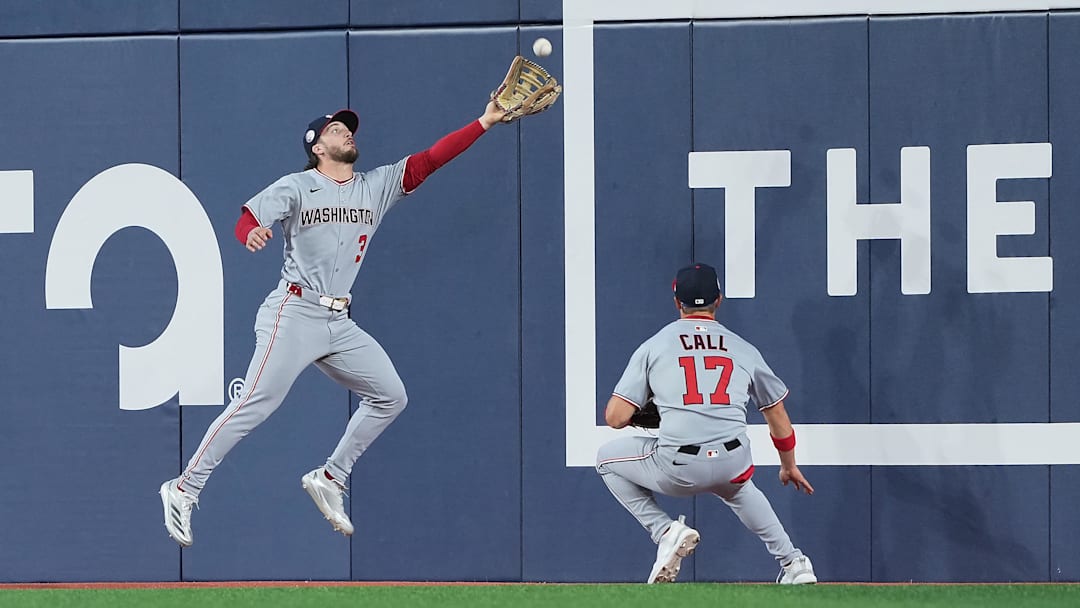 Apr 2, 2025; Toronto, Ontario, CAN; Washington Nationals centre fielder Dylan Crews (3) attempts to catch a fly ball against the Toronto Blue Jays during the second inning at Rogers Centre. Mandatory Credit: Nick Turchiaro-Imagn Images
