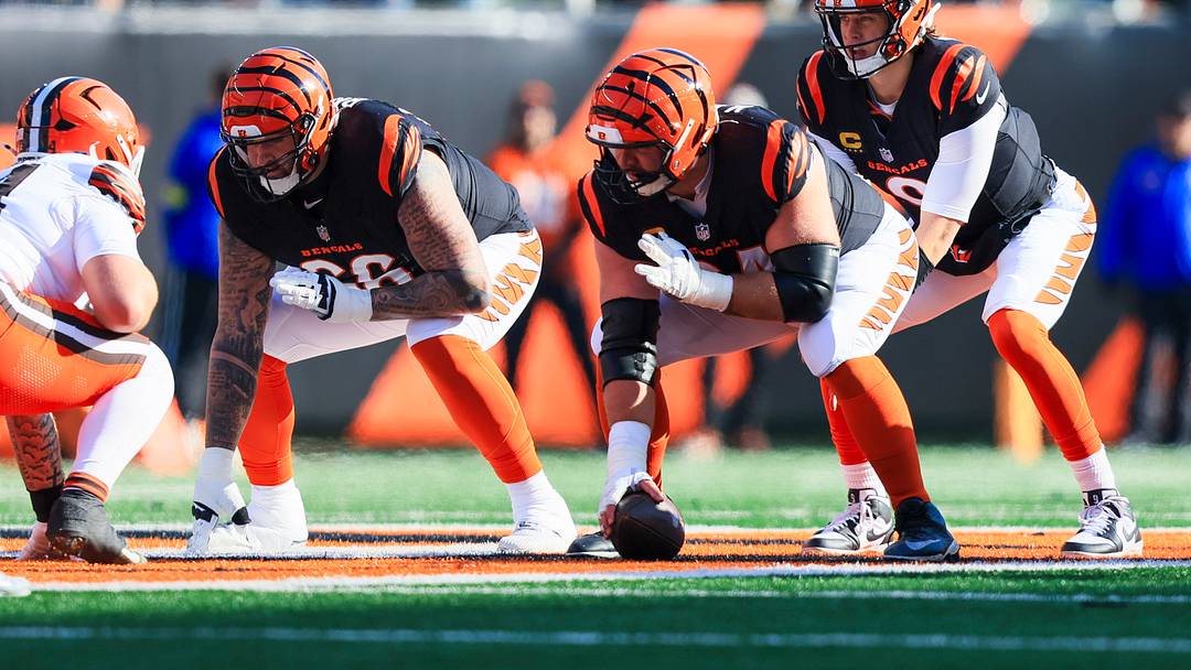 Jan 4, 2026; Cincinnati, Ohio, USA; Cincinnati Bengals quarterback Joe Burrow (9) stands over center Ted Karras (64) during the first quarter against the Cleveland Browns at Paycor Stadium. Mandatory Credit: Katie Stratman-Imagn Images Jan 4, 2026; Cincinnati, Ohio, USA; Cincinnati Bengals quarterback Joe Burrow (9) stands over center Ted Karras (64) during the first quarter against the Cleveland Browns at Paycor Stadium. Mandatory Credit: Katie Stratman-Imagn Images