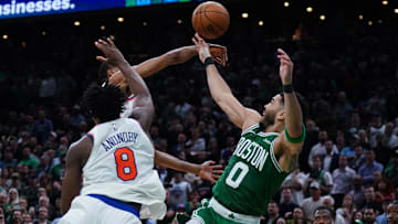 New York Knicks forward Mikal Bridges defends against Boston Celtics forward Jayson Tatum in the 2025 NBA Playoffs