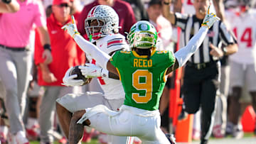 Oregon Ducks defensive back Nikko Reed (9) celebrates before realizing Ohio State Buckeyes wide receiver Jeremiah Smith (4) made a catch during the College Football Playoff quarterfinal at the Rose Bowl in Pasadena, Calif. on Jan. 1, 2025. Ohio State won 41-21.