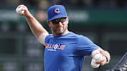 Aug 26, 2023; Pittsburgh, Pennsylvania, USA; Chicago Cubs bench coach Andy Green (29) throws batting practice before a game against the Pittsburgh Pirates at PNC Park. Mandatory Credit: Charles LeClaire-Imagn Images