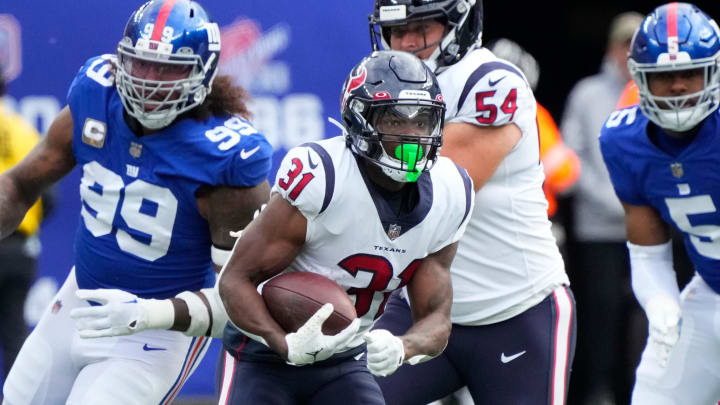 Nov 13, 2022; East Rutherford, NJ, USA;  Houston Texans running back Dameon Pierce (31) runs the ball during the first half of a game against the New York Giants  at MetLife Stadium. Mandatory Credit: Robert Deutsch-USA TODAY Sports