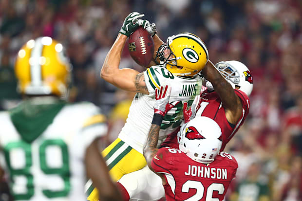 Green Bay Packers wide receiver Jeff Janis (83) catches a Hail Mary pass for a touchdown against Patrick Peterson.