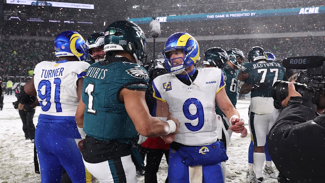 Jan 19, 2025; Philadelphia, Pennsylvania, USA; Philadelphia Eagles quarterback Jalen Hurts (1) greets Los Angeles Rams quarterback Matthew Stafford (9) after their game in a 2025 NFC divisional round game at Lincoln Financial Field. Mandatory Credit: Bill Streicher-Imagn Images