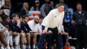 Penn State men's basketball coach Mike Rhoades looks on from the bench during the first half against the Iowa Hawkeyes at Bryce Jordan Center in 2023. 