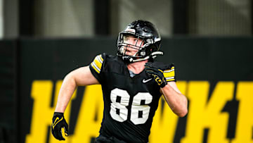 Iowa tight end Steven Stilianos (86) runs a route during a spring NCAA football practice, Thursday, March 30, 2023, at the University of Iowa Indoor Practice Facility in Iowa City, Iowa.

230330 Iowa Spring Fb 075 Jpg