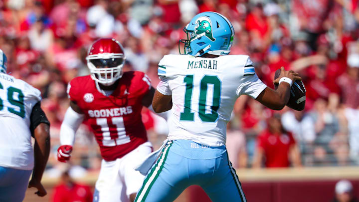 Sep 14, 2024; Norman, Oklahoma, USA;  Tulane Green Wave quarterback Darian Mensah (10) throws during the second quarter against the Oklahoma Sooners at Gaylord Family-Oklahoma Memorial Stadium.