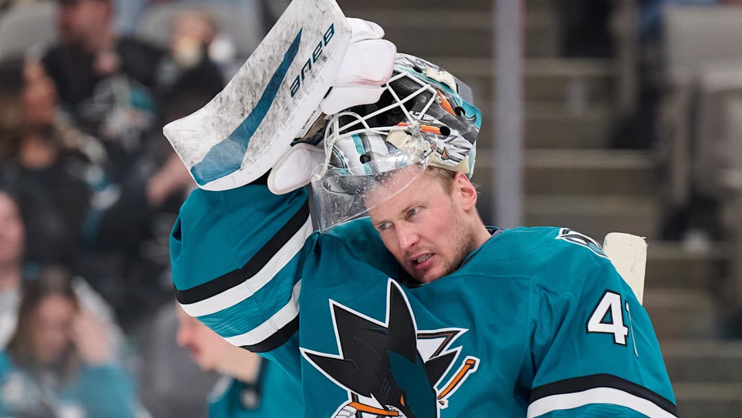 Feb 8, 2025; San Jose, California, USA; San Jose Sharks goaltender Vitek Vanecek (41) raises his hockey mask during a timeout against the Dallas Stars during the third period at SAP Center at San Jose. Mandatory Credit: Robert Edwards-Imagn Images