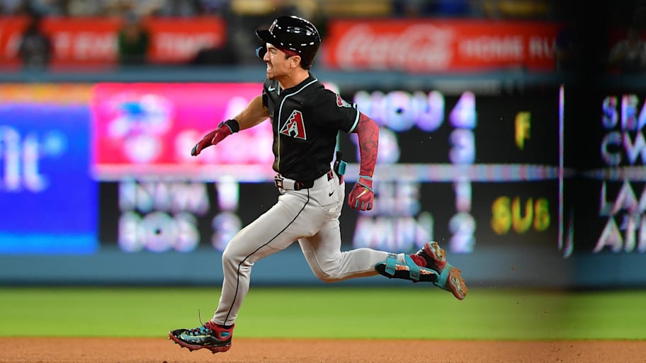 Corbin Carroll hit a triple against the Dodgers.  | Gary A. Vasquez-Imagn Images