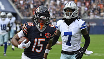 Sep 21, 2025; Chicago, Illinois, USA; Chicago Bears wide receiver Rome Odunze (15) catches a touchdown pass against Dallas Cowboys wide receiver Traeshon Holden (7) during the first half at Soldier Field. Mandatory Credit: Matt Marton-Imagn Images