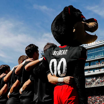 Sep 23, 2023; Cincinnati, Ohio, USA; The Cincinnati Bearcats mascot stands on the field during the playing of the Alma Mater prior to the game against the Oklahoma Sooners at Nippert Stadium. Mandatory Credit: Katie Stratman-Imagn Images