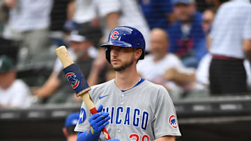 Jul 26, 2025; Chicago, Illinois, USA; Chicago Cubs right fielder Kyle Tucker (30) prepares to bat near the on deck circle with a bat weight during a game against the Chicago White Sox at Rate Field. Mandatory Credit: Patrick Gorski-Imagn Images