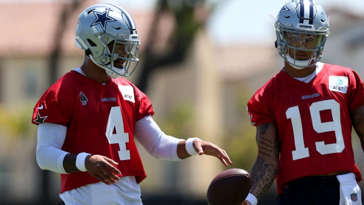 Jul 26, 2024; Oxnard, CA, USA; Dallas Cowboys quarterbacks Dak Prescott (4) and Trey Lance (19) during training camp at the River Ridge Playing Fields in Oxnard, California.