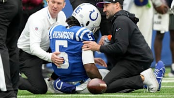 Team personnel tend to Indianapolis Colts quarterback Anthony Richardson (5) after hurting his