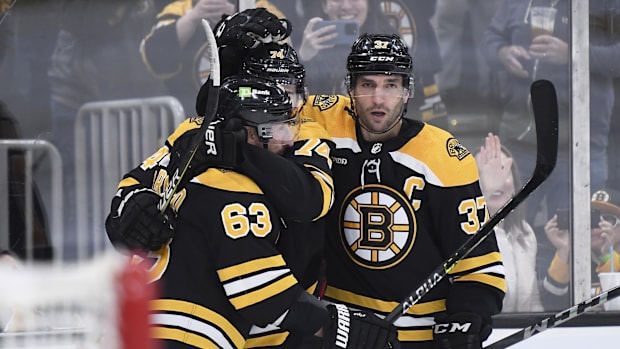 Patrice Bergeron and Brad Marchan