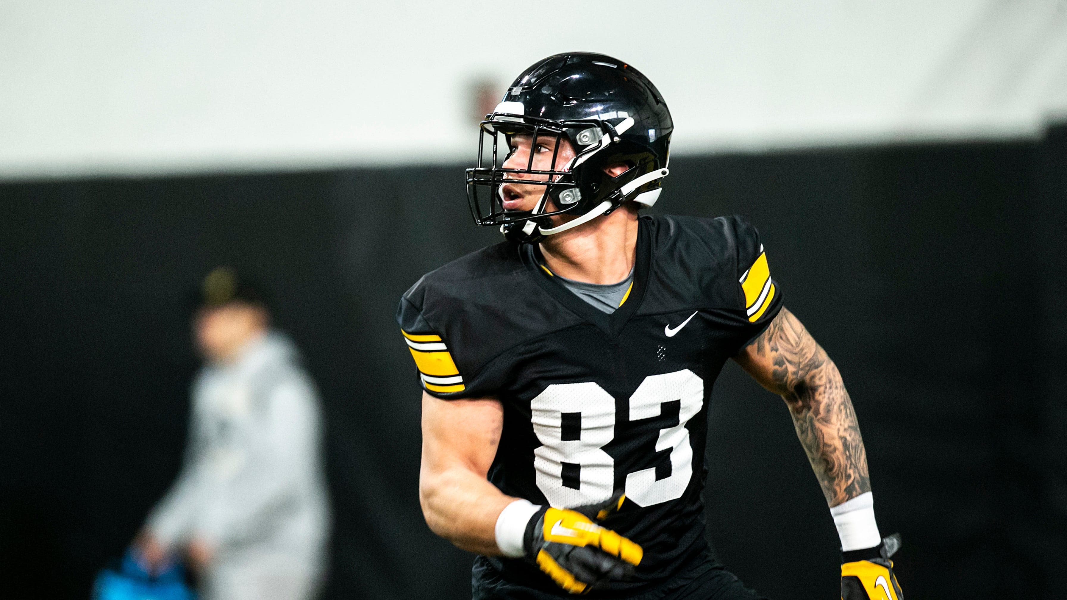 Iowa tight end Erick All (83) runs a route during a spring NCAA football practice, Thursday, March