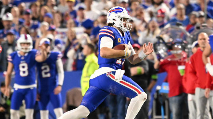 Oct 26, 2023; Orchard Park, NY; Buffalo Bills quarterback Josh Allen (17) runs for a first down in the third quarter against the Tampa Bay Buccaneers at Highmark Stadium.