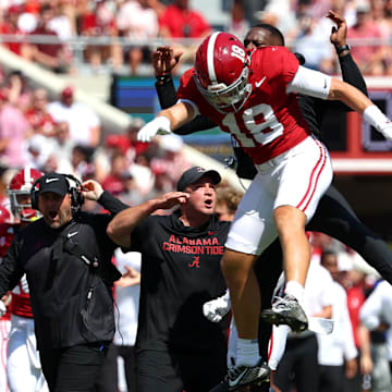 Sep 13, 2025; Tuscaloosa, Alabama, USA; Alabama Crimson Tide defensive back Bray Hubbard (18) celebrates his interception during the first quarter against the Wisconsin Badgers at Saban Field at Bryant-Denny Stadium. 