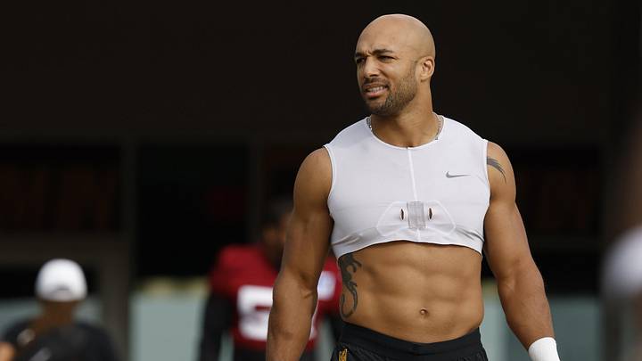 Jul 23, 2025; Ashburn, VA, USA; Washington Commanders running back Austin Ekeler (30) walks out of team headquarters onto the fields prior to practice on day one of training camp at OrthoVirginia Training Center at Commanders Park. Mandatory Credit: Geoff Burke-Imagn Images