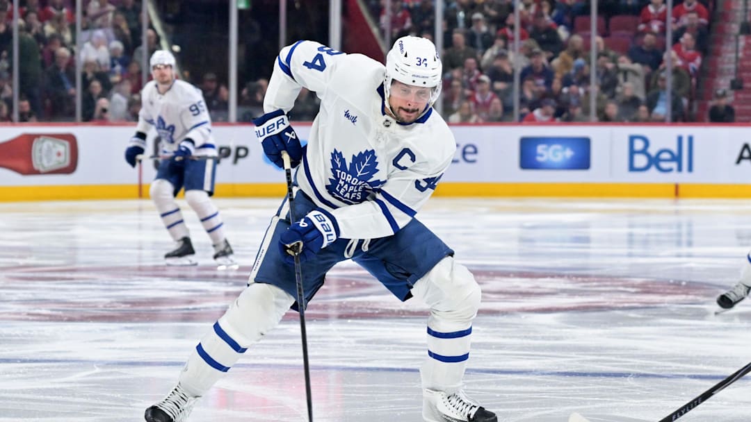 Mar 10, 2026; Montreal, Quebec, CAN; Toronto Maple Leafs forward Auston Matthews (34) plays the puck during the third period against the Montreal Canadiens at the Bell Centre. Mandatory Credit: Eric Bolte-Imagn Images