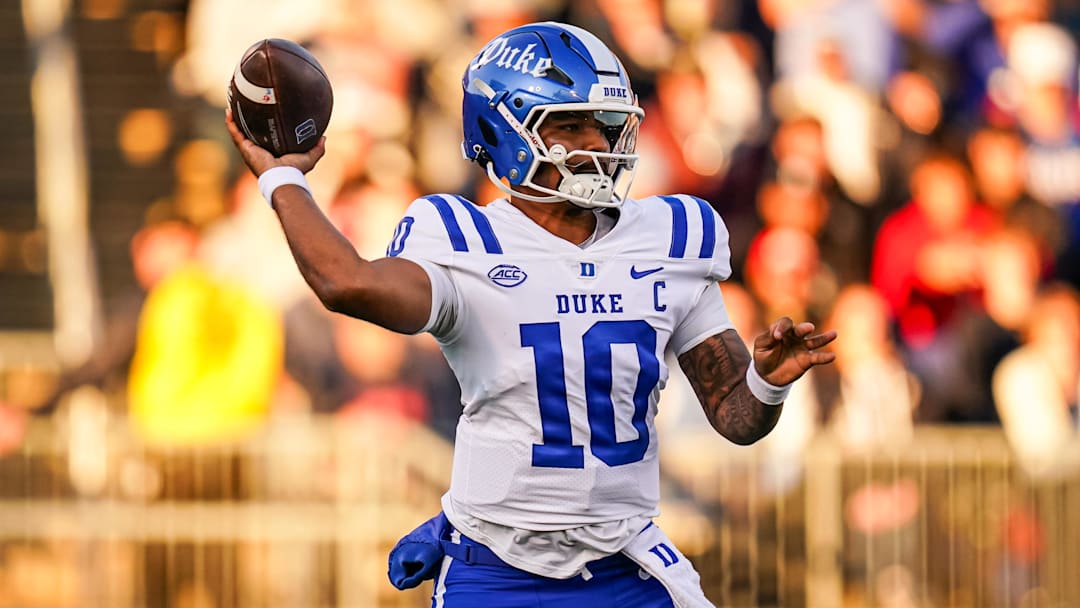 Nov 8, 2025; East Hartford, Connecticut, USA; Duke Blue Devils quarterback Darian Mensah (10) throws a pass against the UConn Huskies in the first quarter at Pratt & Whitney Stadium at Rentschler Field. Mandatory Credit: David Butler II-Imagn ImagesDar