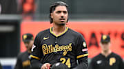 Sep 11, 2025; Baltimore, Maryland, USA;  Pittsburgh Pirates pitcher Johan Oviedo (24) walks on the field before the game between the Baltimore Orioles and the Pittsburgh Pirates at Oriole Park at Camden Yards. Mandatory Credit: James A. Pittman-Imagn Images