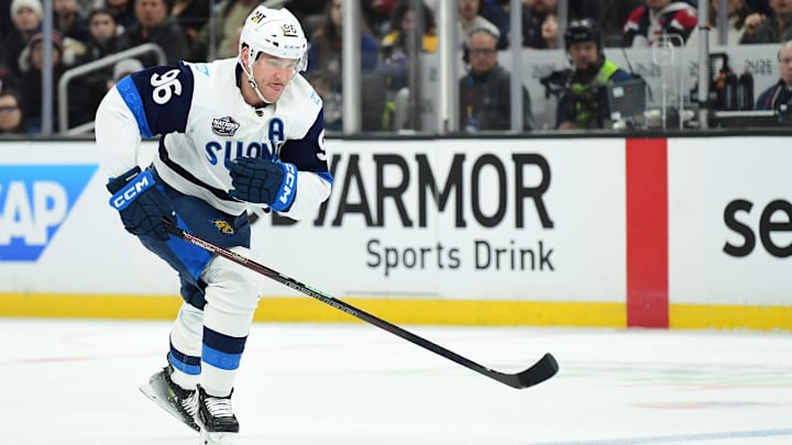 Feb 17, 2025; Boston, MA, USA; [Imagn Images direct customers only]  Team Finland forward Mikko Rantanen (96) skates with the puck during the second period in a 4 Nations Face-Off ice hockey game against Team Canada at TD Garden. Mandatory Credit: Bob DeChiara-Imagn Images