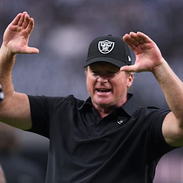 Las Vegas Raiders manager Jon Gruden (right) interacts with the players before the game against the Seattle Seahawks at Allegiant Stadium.