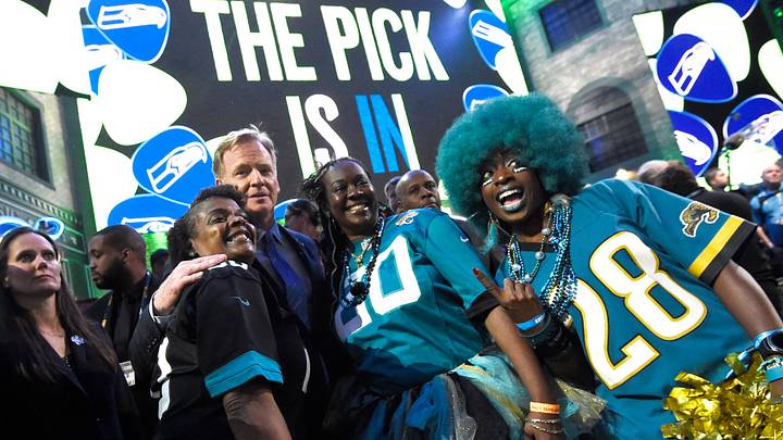 NFL Commisioner Roger Goodell poses with Jaguars fans during the first round of the NFL Draft Thursday, April 25, 2019, in Nashville, Tenn.