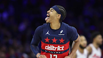 Mar 26, 2025; Philadelphia, Pennsylvania, USA; Washington Wizards guard Jordan Poole (13) reacts after scoring against the Philadelphia 76ers during the third quarter at Wells Fargo Center. Mandatory Credit: Bill Streicher-Imagn Images
