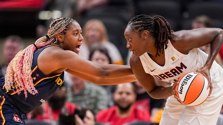 May 9, 2024; Indianapolis, IN, USA; Indiana Fever forward Aliyah Boston (7) guards Atlanta Dream forward Tina Charles