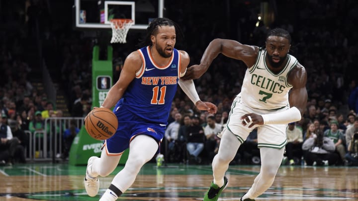 Apr 11, 2024; Boston, Massachusetts, USA;  New York Knicks guard Jalen Brunson (11) controls the ball while Boston Celtics guard Jaylen Brown (7) defends during the first half at TD Garden. Mandatory Credit: Bob DeChiara-USA TODAY Sports