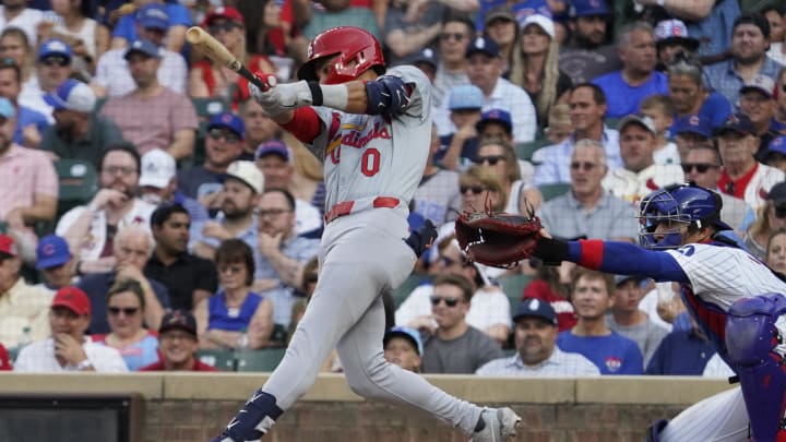 St. Louis Cardinals shortstop Masyn Winn (0) hits a two-run home run against the Chicago Cubs during the third inning at Wrigley Field on Aug 4.