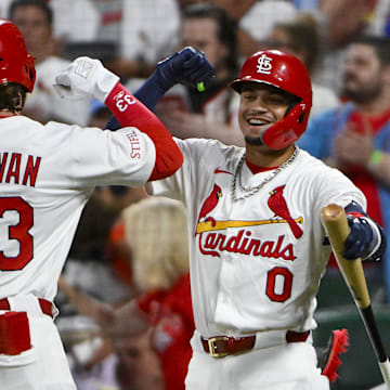 Jul 8, 2025; St. Louis, Missouri, USA;  St. Louis Cardinals left fielder Brendan Donovan (33) celebrates with shortstop Masyn Winn (0) after hitting a two run home run against the Washington Nationals during the third inning at Busch Stadium. Mandatory Credit: Jeff Curry-Imagn Images