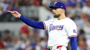 Jul 2, 2024; Arlington, Texas, USA;  Texas Rangers starting pitcher Nathan Eovaldi (17) reacts during the seventh inning against the San Diego Padres at Globe Life Field.