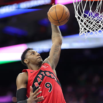 Mar 30, 2025; Philadelphia, Pennsylvania, USA; Toronto Raptors guard RJ Barrett (9) dunks the ball against the Philadelphia 76ers during the fourth quarter at Wells Fargo Center. Mandatory Credit: Bill Streicher-Imagn Images
