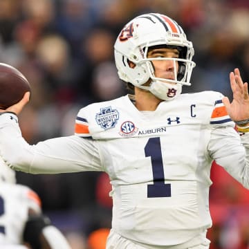 Dec 30, 2023; Nashville, TN, USA;  Auburn Tigers quarterback Payton Thorne (1) throws a pass against the Maryland Terrapins during the second half at Nissan Stadium. Mandatory Credit: Steve Roberts-USA TODAY Sports
